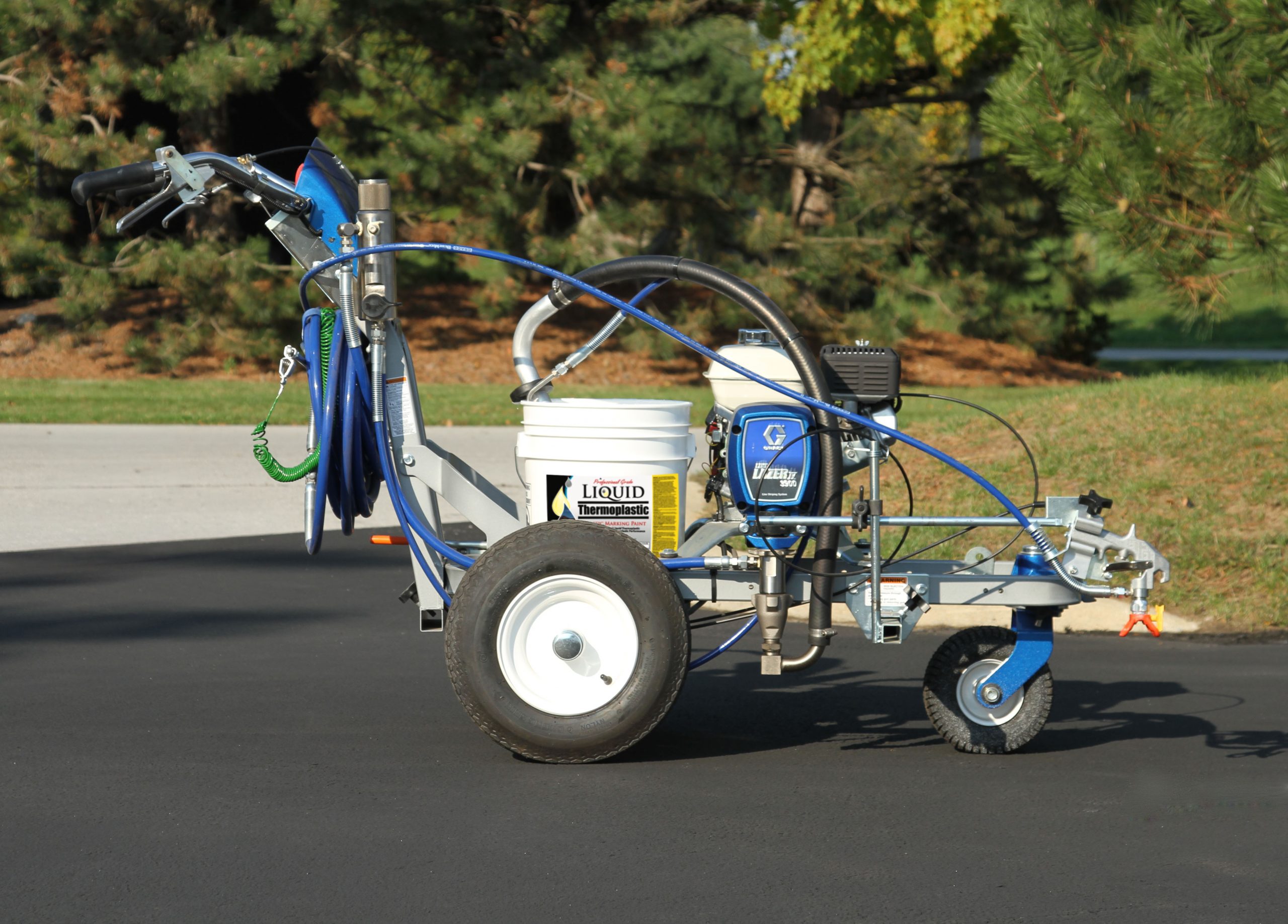 Getting ready to apply SealMaster Liquid Thermoplastic Traffic Paint to a parking lot. Learn how to stripe a parking lot.
