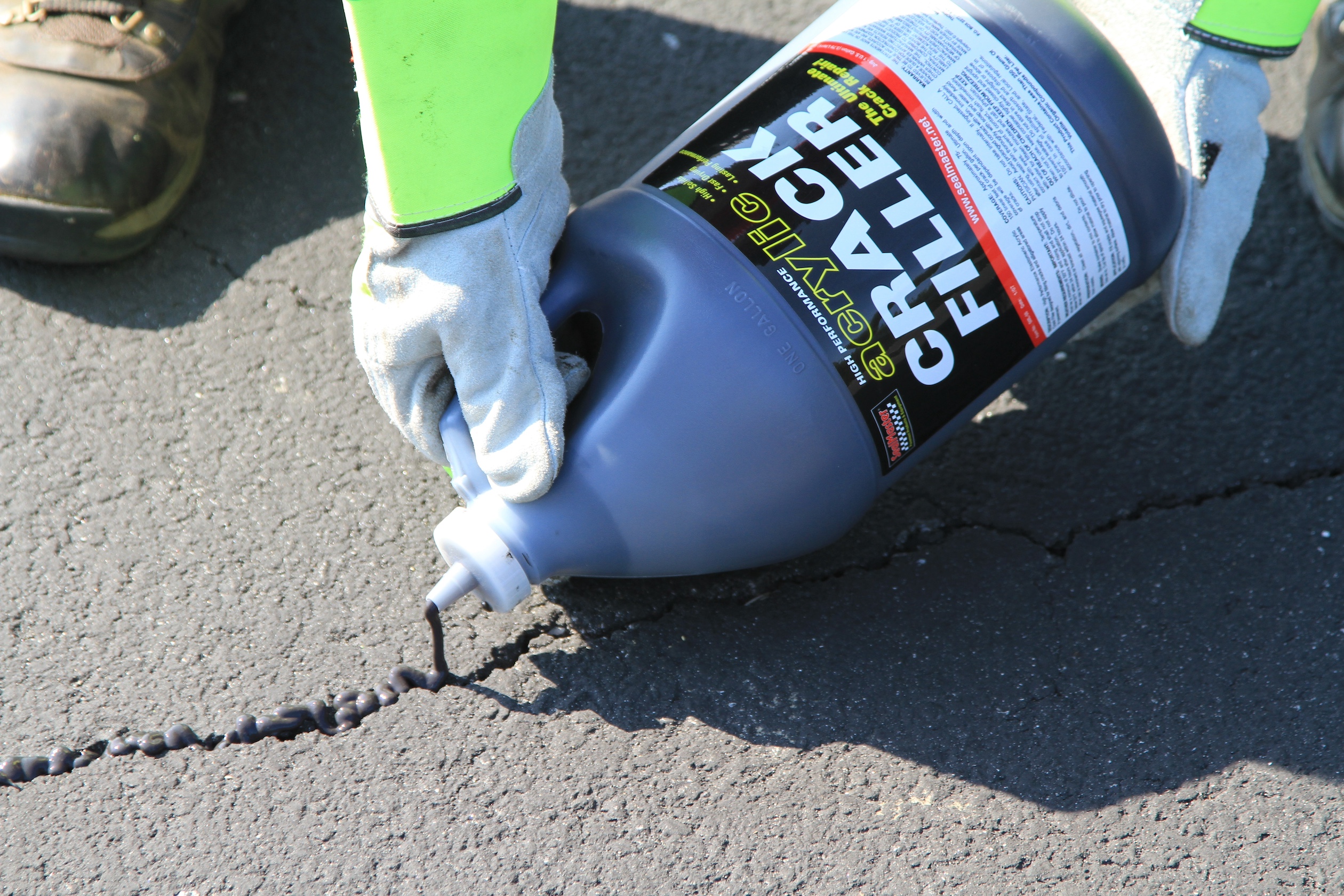 SealMaster Acrylic Crack Filler Application SealMaster Acrylic Crack Filler application on parking lot