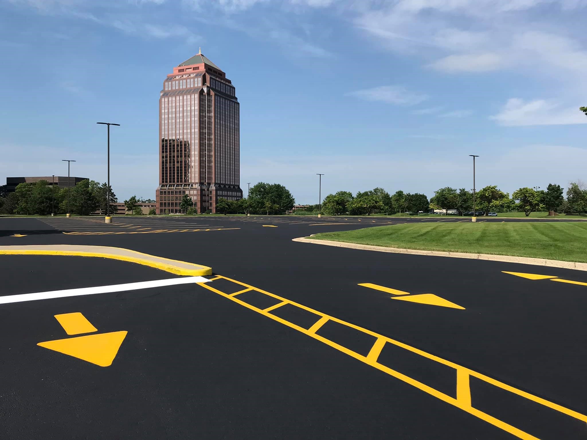 Asphalt-based sealer on a parking lot in Illinois.