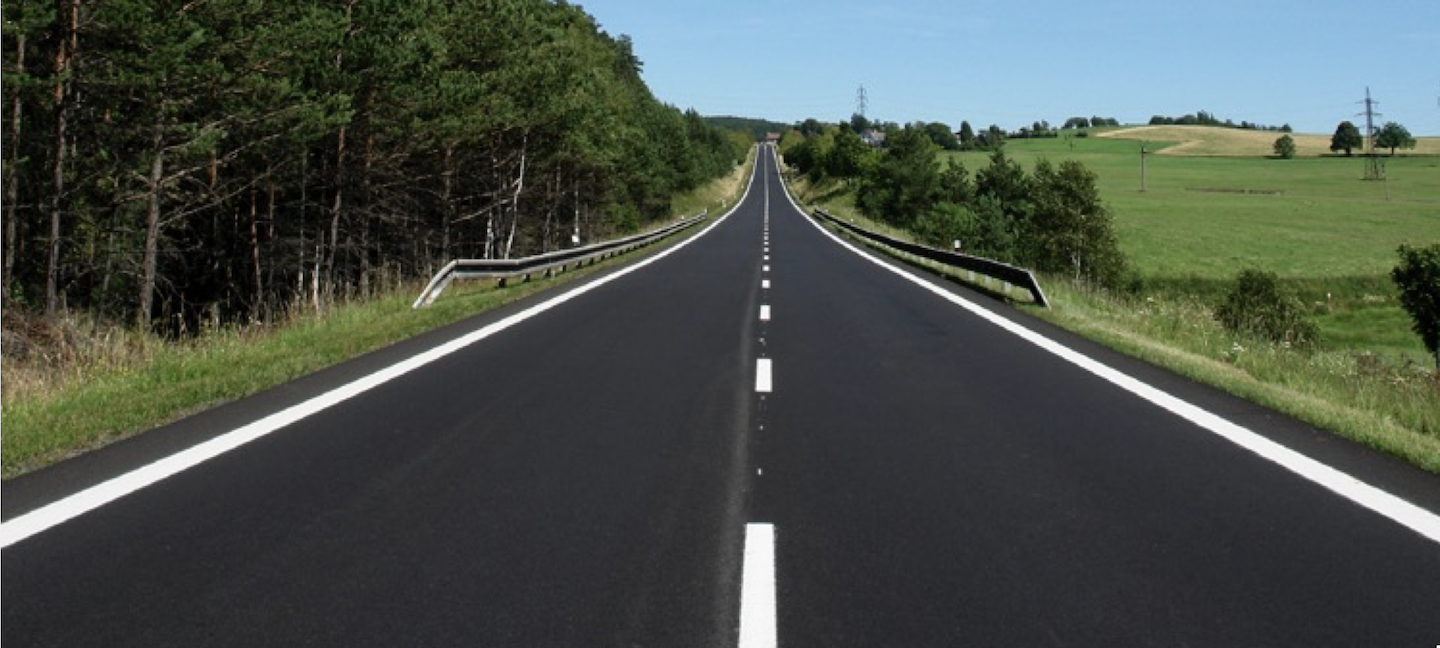 SealMaster asphalt sealcoat on a country road