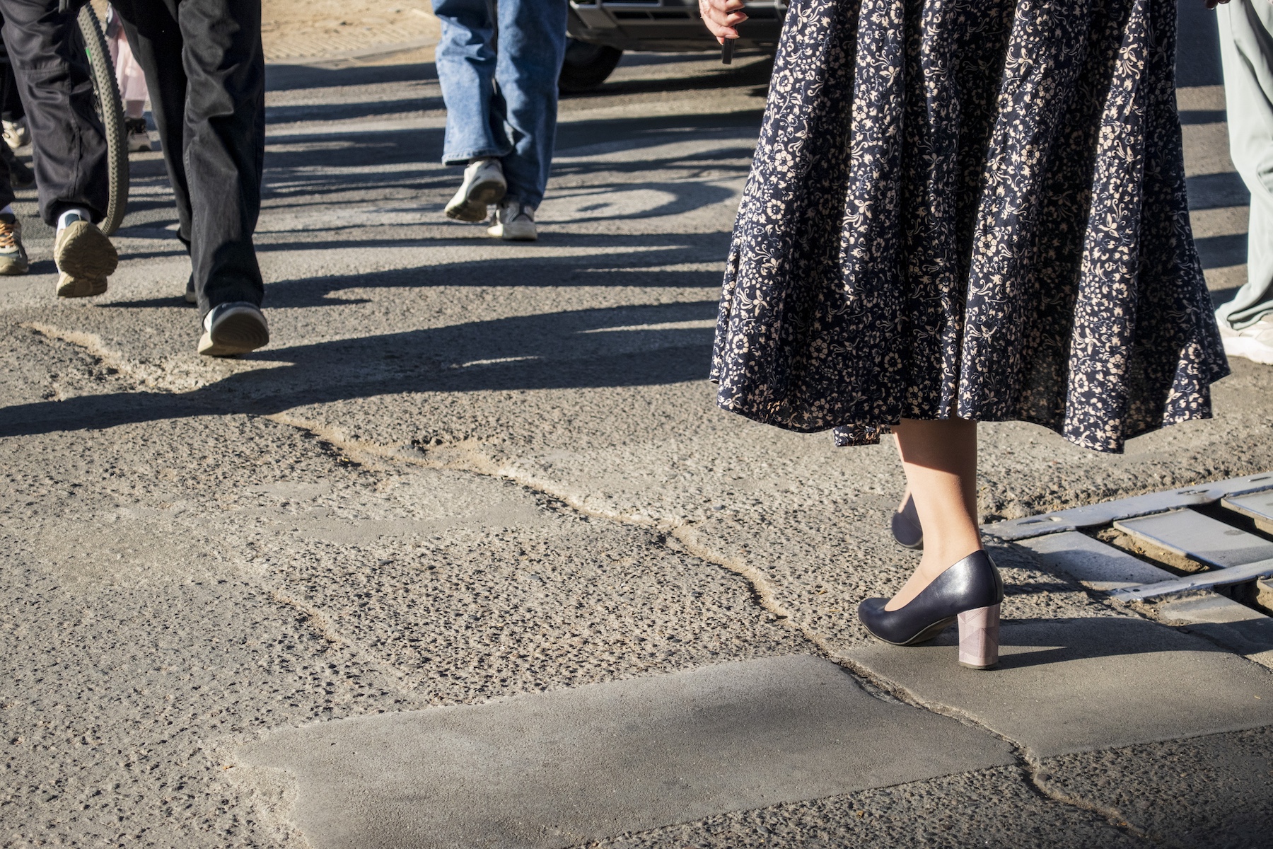 Walking on unrepaired cracked pavement